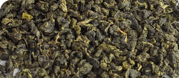 Close-up of dried green tea leaves